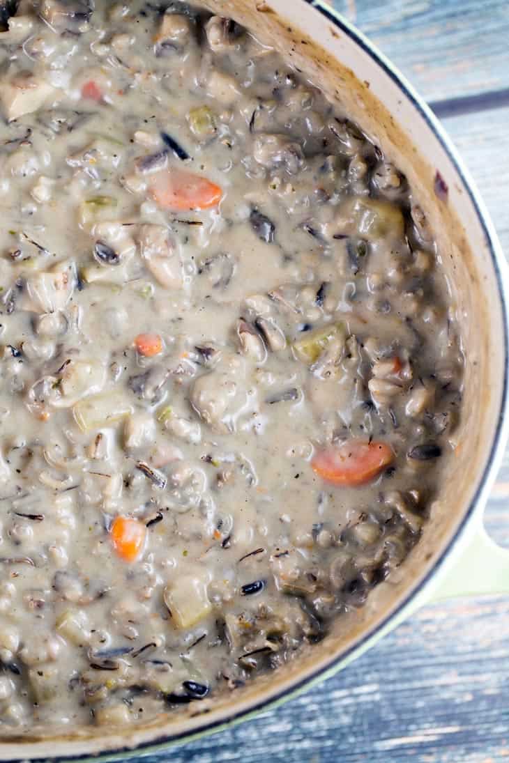 large dutch oven filled with mushroom soup.