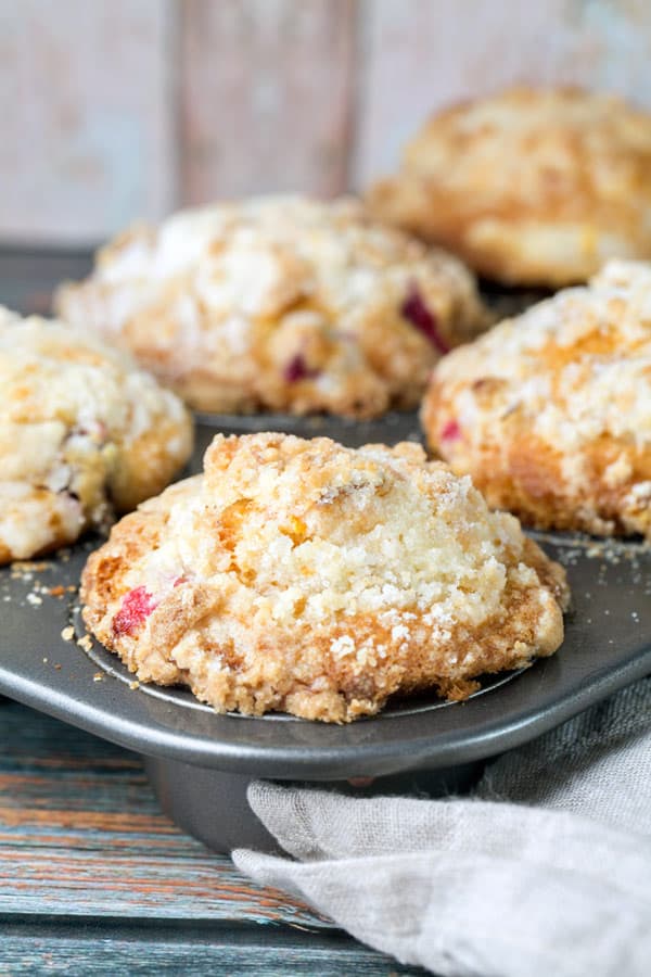 side view of muffins showing the streusel topping and the giant domed top.