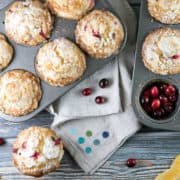 Cranberry Orange Streusel Muffins: tart cranberries and oranges pair perfectly with a sweet crumbly streusel topping in these giant, domed muffins. The best way to start off a cold, dreary winter morning! {Bunsen Burner Bakery} #muffins #streusel #cranberryorange