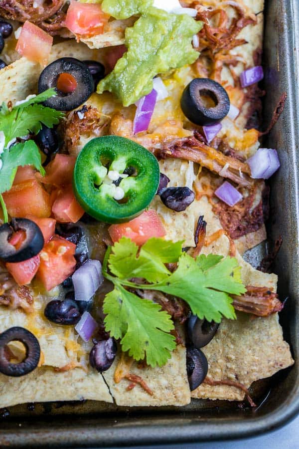 Sheet Pan Nachos: the ultimate loaded nachos are just 10 minutes and one sheet pan away. Easy entertaining - perfect for parties... or dinner! {Bunsen Burner Bakery} #nachos #appetizers #partyfood #superbowl