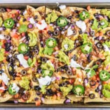 Sheet Pan Nachos: the ultimate loaded nachos are just 10 minutes and one sheet pan away. Easy entertaining - perfect for parties... or dinner! {Bunsen Burner Bakery} #nachos #appetizers #partyfood #superbowl