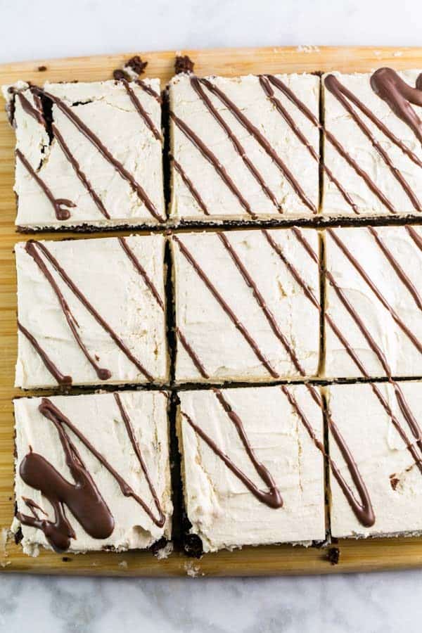 Brownies with Salted Tahini Buttercream: elevate your brownie game with a thick layer of salted tahini buttercream frosting. With a subtle nutty flavor, tahini is the perfect flavor for thick, fluffy buttercream. {Bunsen Burner Bakery} #brownies #tahini #tahinifrosting #buttercream