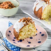 Coconut Bundt Cake: an exceptionally moist triple-coconut cake (coconut milk, coconut extract, and shredded coconut) topped with a coconut glaze and toasted coconut. Outrageously delicious! {Bunsen Burner Bakery} #coconutcake #bundtcake #coconut