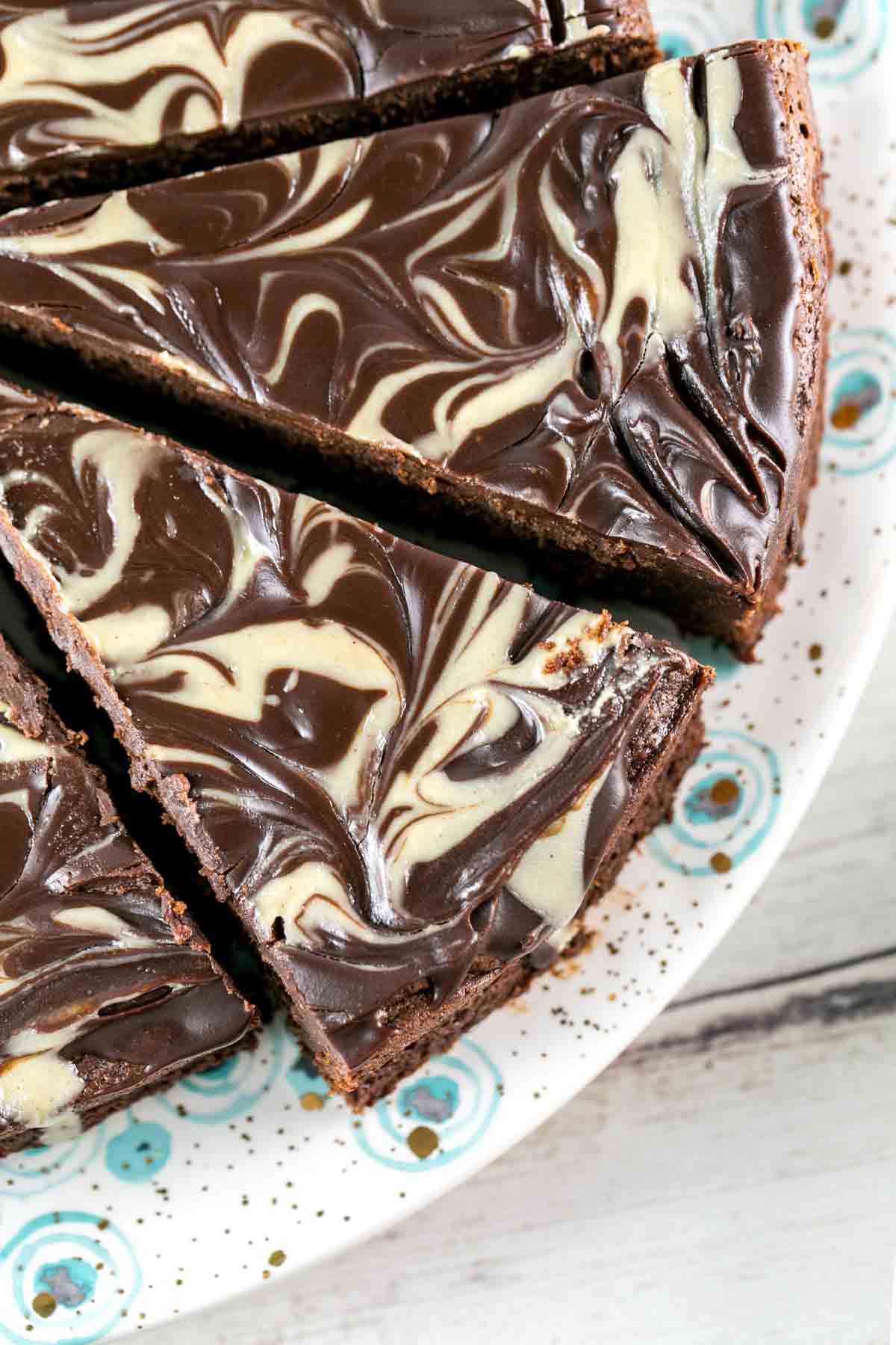 Flourless Chocolate Tahini Cake: Gluten free, Passover friendly, delicious all the time. A rich, decadent flourless chocolate cake with swirls of tahini make an easy, elegant cake. {Bunsen Burner Bakery} #glutenfree #passover #tahini #cake