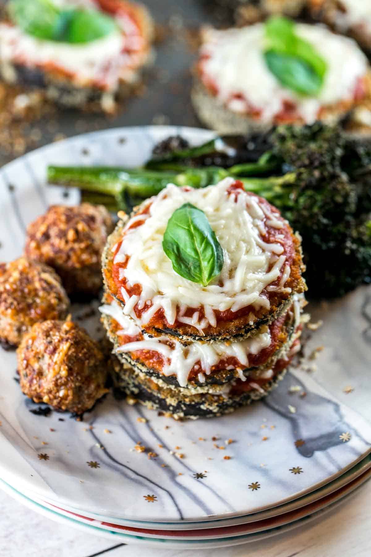 Sheet Pan Eggplant Parmesan: make a classic Italian dish healthier and quick with this weeknight-friendly baked sheet pan dinner and a side of turkey meatballs. Skip frying and bake instead! {Bunsen Burner Bakery} #eggplantparm #sheetpan #dinner