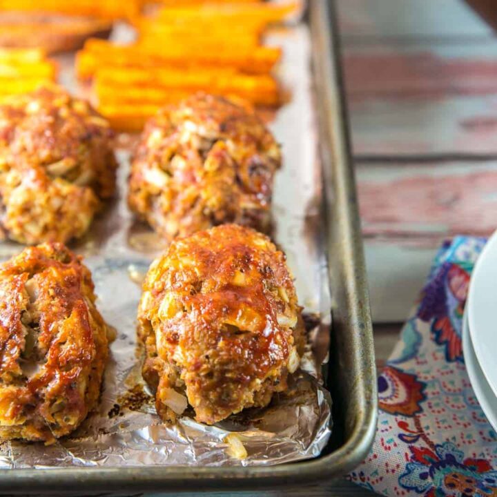 individual mini meatloaf on a foil lined sheet pan.