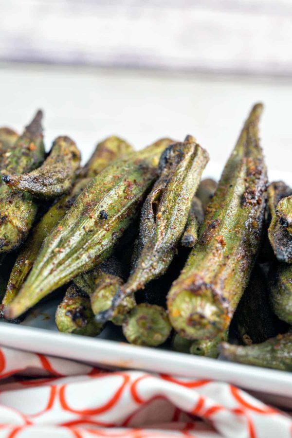 lightly charred okra pods covered in garlic powder, chili powder, cumin, and smoked paprika