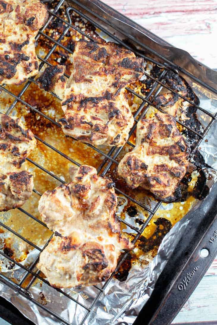 grilled chicken on a cooling rack