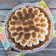 Chocolate s'mores pie covered with perfectly toasted marshmallows