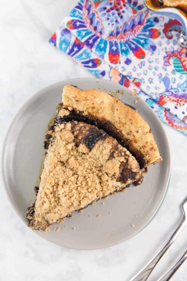 overhead view of a single slice of chocolate wet bottom shoofly pie on a dessert plate