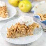 Caramel Pear Pie with Oatmeal Cookie Crumble: Step aside, apple pie -- there's a new fall favorite in town! Cinnamon sugar pears, homemade caramel sauce, and a crunchy oatmeal topping. #bunsenburnerbakery #pie #pearpie #fallbaking