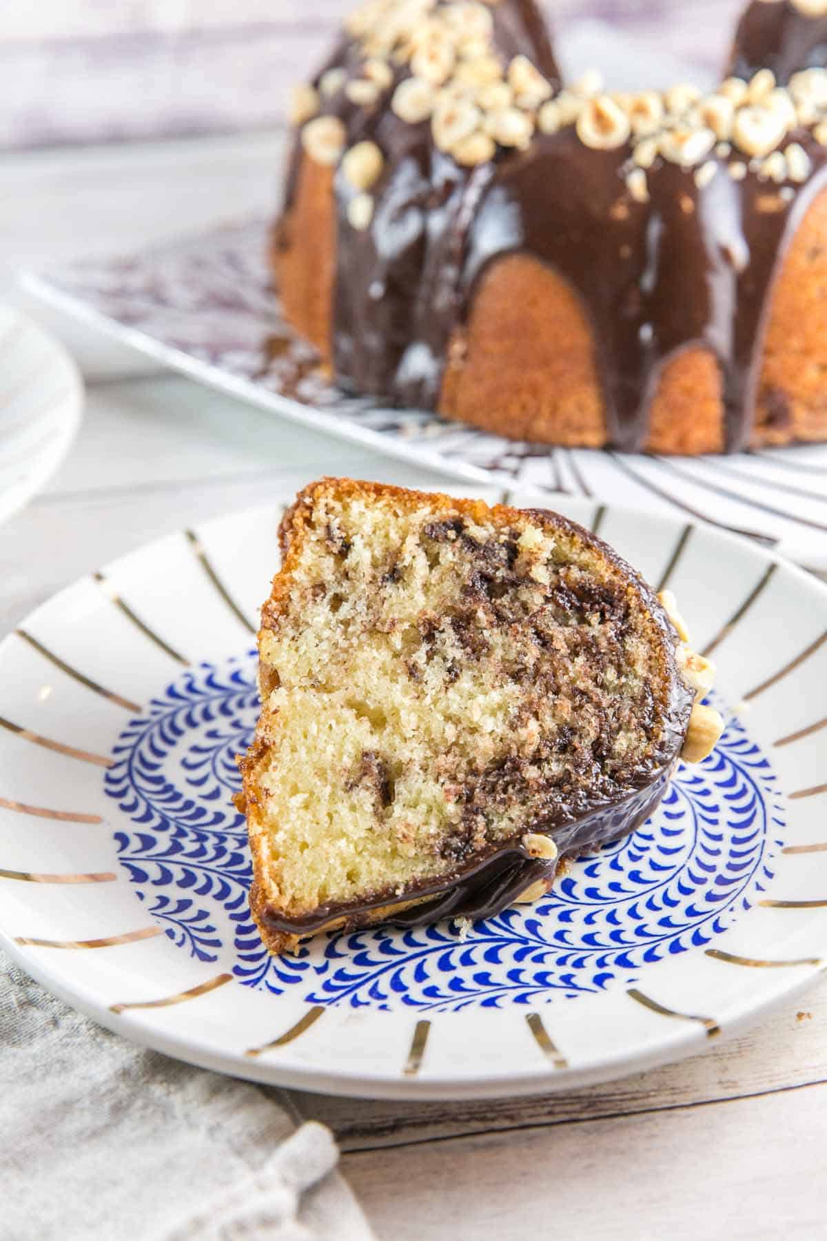 cut slice of bundt cake with nutella swirls