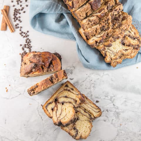 Best Chocolate Babka: Rich, butter yeast bread with swirls of a chocolate-cinnamon filling and covered with a streusel topping, this chocolate babka is even better than one from a classic Jewish deli. #bunsenburnerbakery #yeastbreads #babka #chocolatebabka