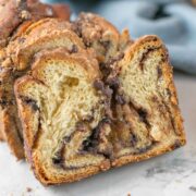 slice of chocolate babka showing the swirled gooey center