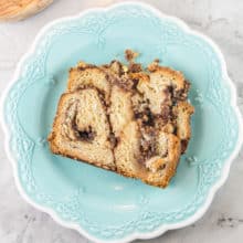 Cinnamon Hazelnut Babka: with a triple dose of cinnamon (in the dough, the filling, and the streusel topping) and chopped hazelnuts, this is not a lesser babka! #bunsenburnerbakery #babka #cinnamonbabka #yeastbread #hazelnuts