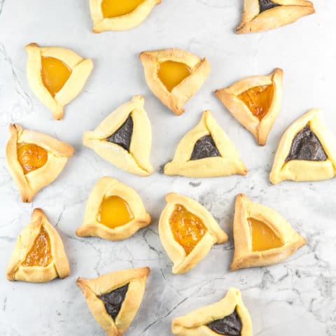 Cake Mix Hamantaschen: Want to make hamantaschen for Purim but looking for a shortcut? This dough tastes like the real deal, but only takes 3 minutes to mix together! #bunsenburnerbakery #hamantaschen #purim #cookies #cakemix
