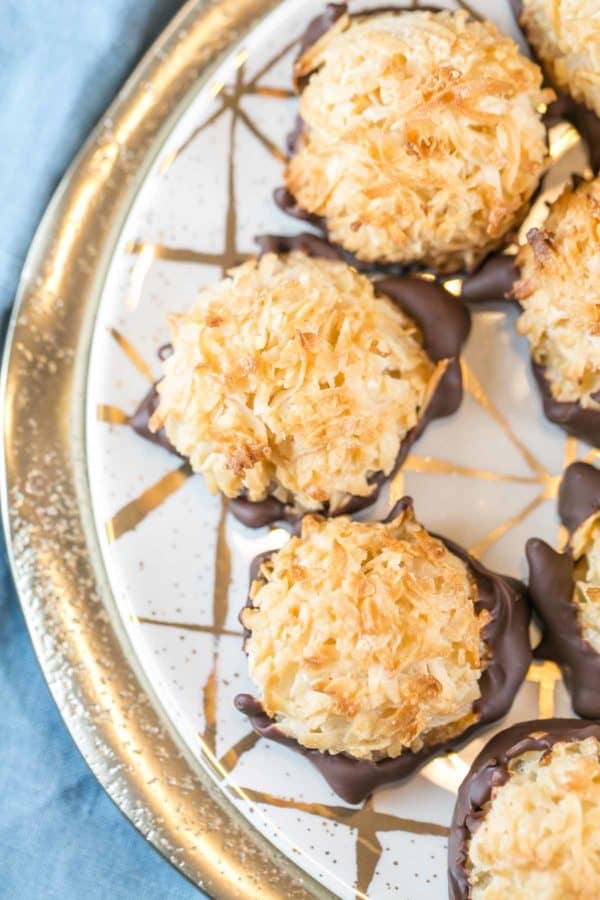 closeup overhead view of the golden brown color of chocolate dipped coconut macaroons
