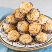 Chocolate Dipped Coconut Macaroons: It's just not spring without a batch of these homemade chocolate dipped coconut macaroons! These sweet treats are so easy to make, there's no reason to buy them from a can. #bunsenburnerbakery #macaroons #coconutmacaroons #glutenfree #passover