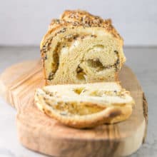 Everything Bagel Babka: filled with swirls of cream cheese and classic everything bagel seasonings, this savory babka is the perfect garlicky, oniony, salty, cream cheese swirly, breakfast, dinner, or anytime snack! #bunsenburnerbakery #babka #yeastbread #everythingbagel