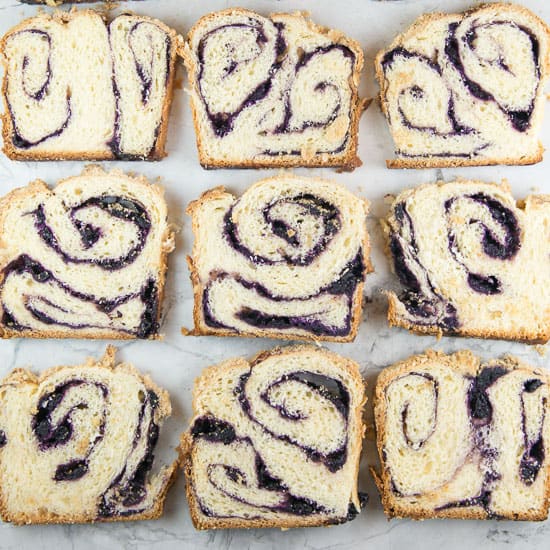 Blueberry Babka with Almond Streusel: homemade blueberry jam swirled in a rich babka dough, topped with crunchy almond streusel.  With step-by-step photos and instructions, this blueberry babka recipe is easy enough for even new bakers! #bunsenburnerbakery #babka #bread #blueberrybread