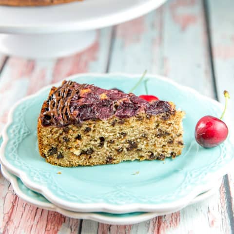 Chocolate Chip Cherry Upside Down Cake: an easy one bowl sour cream coffee cake recipe turned into a chocolate cherry upside down cake make with fresh cherries. The perfect make ahead breakfast or snack cake -- keep one in your freezer to pull out for unexpected guests! #bunsenburnerbakery #upsidedowncake #cherrycake #cherrychocolatecake