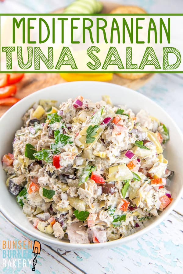 Mediterranean Tuna Salad: This easy make-ahead recipe is full of flavor and anything but boring! Full of marinated artichokes, bell peppers, Greek olives, parsley, and lemon juices, it's healthy, delicious, and the perfect lunch or dinner. 