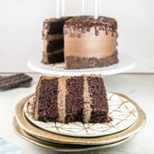Best Chocolate Layer Cake: This easy homemade chocolate layer cake with chocolate buttercream frosting and ganache is rich and moist! The recipe is simple to make and always turns out perfectly. With step by step instructions for how to assemble, even beginning bakers will succeed! #bunsenburnerbakery #chocolatecake #layercake #birthdaycake 