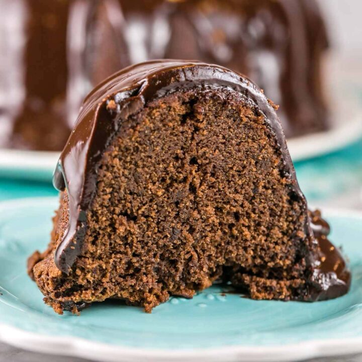 slice of chocolate pound cake on a blue dessert plate