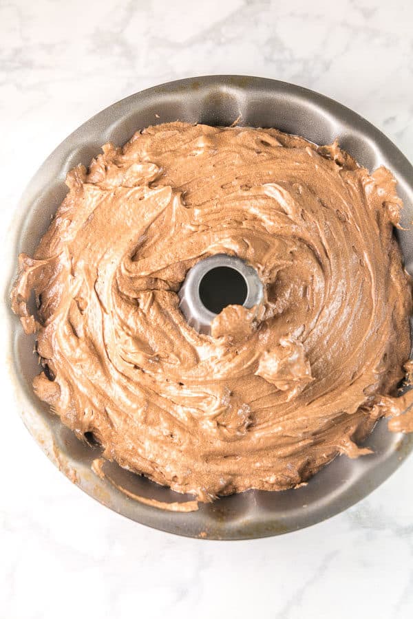 chocolate pound cake batter in a bundt pan