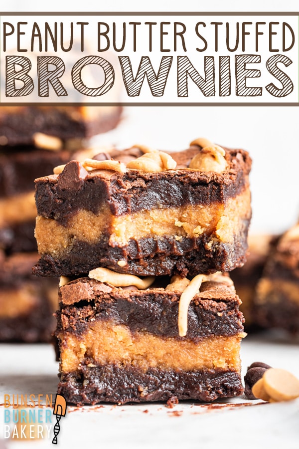 Peanut Butter Stuffed Brownies: an easy homemade recipe for fudgy brownies stuffed with a thick layer of peanut butter and topped with peanut butter chips and a peanut butter drizzle!