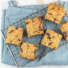 Chocolate Chip Tahini Blondies: Easy to make and unexpectedly delicious, these salted chocolate chunk tahini blondies will be your new favorite (dairy free!) treat.  A little gooey and chewy, it's like the grown up version of a peanut butter cookie bar. #bunsenburnerbakery #blondies #tahini #tahiniblondies 