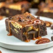 caramel pecan brownie dripping with salted caramel sauce