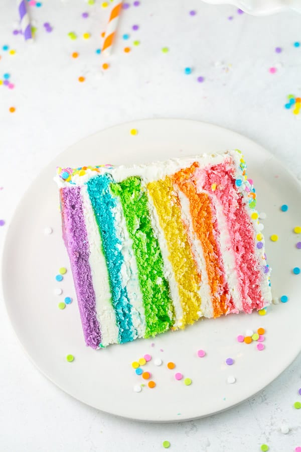 slice of a six layered cake on a cake plate