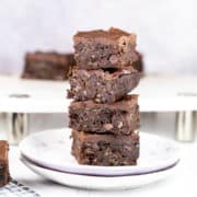 stack of brownies made with zucchini