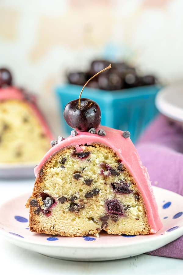 slice of pound cake filled with cherries and chocolate chips