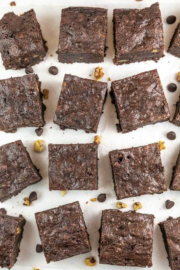 overhead view of brownies with chocolate chips and chopped walnuts