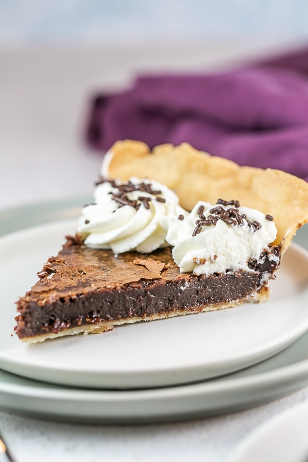 side view of brownie pie showing the gooey custard like middle