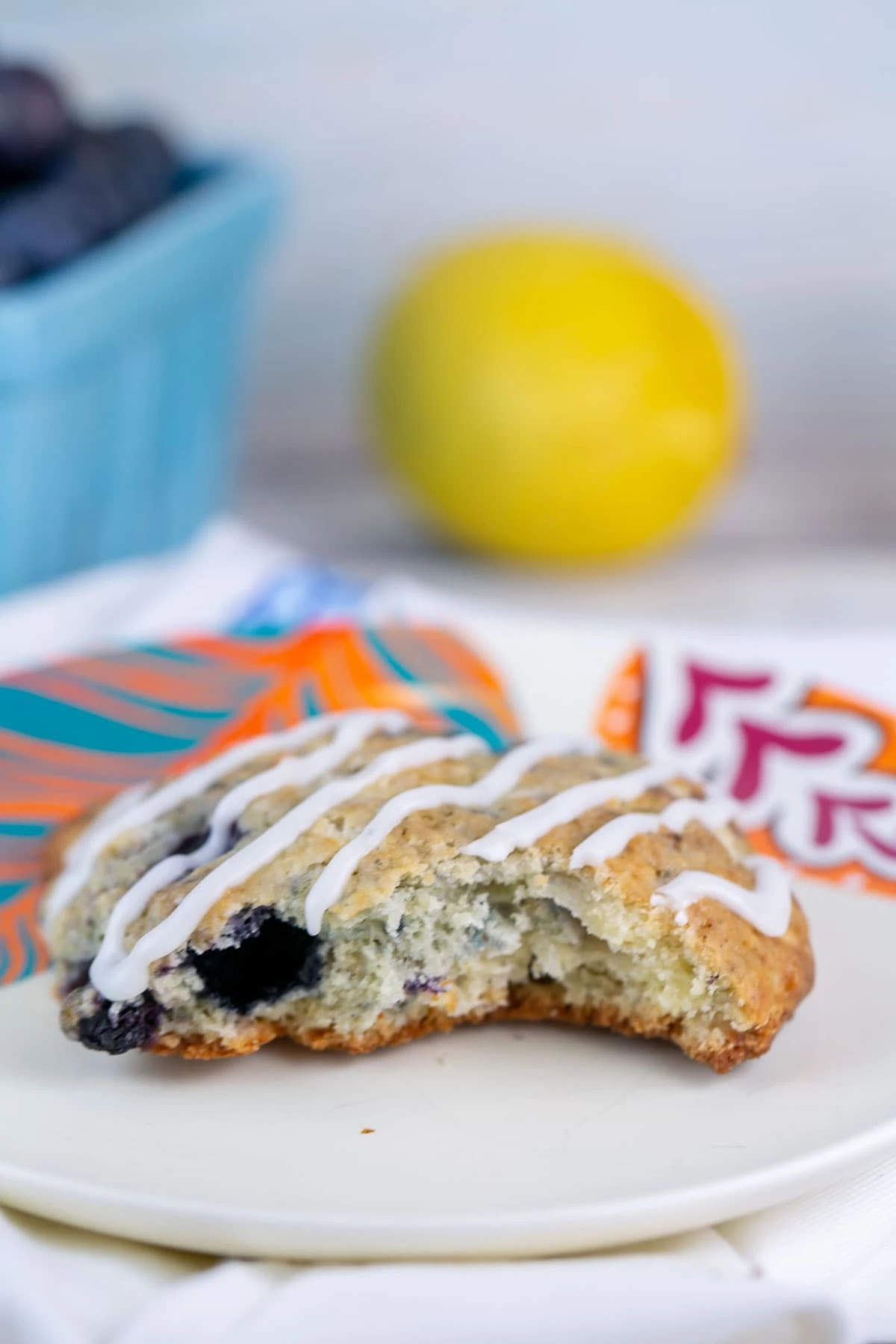 side view of a scone with one bite taken out of it
