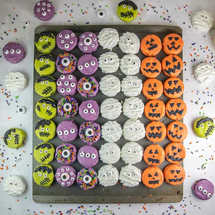 Chocolate Covered Halloween Oreos: These super easy, no bake treats are perfect for parties or treat bags! Kids love to help decorate them - and eat them, too!