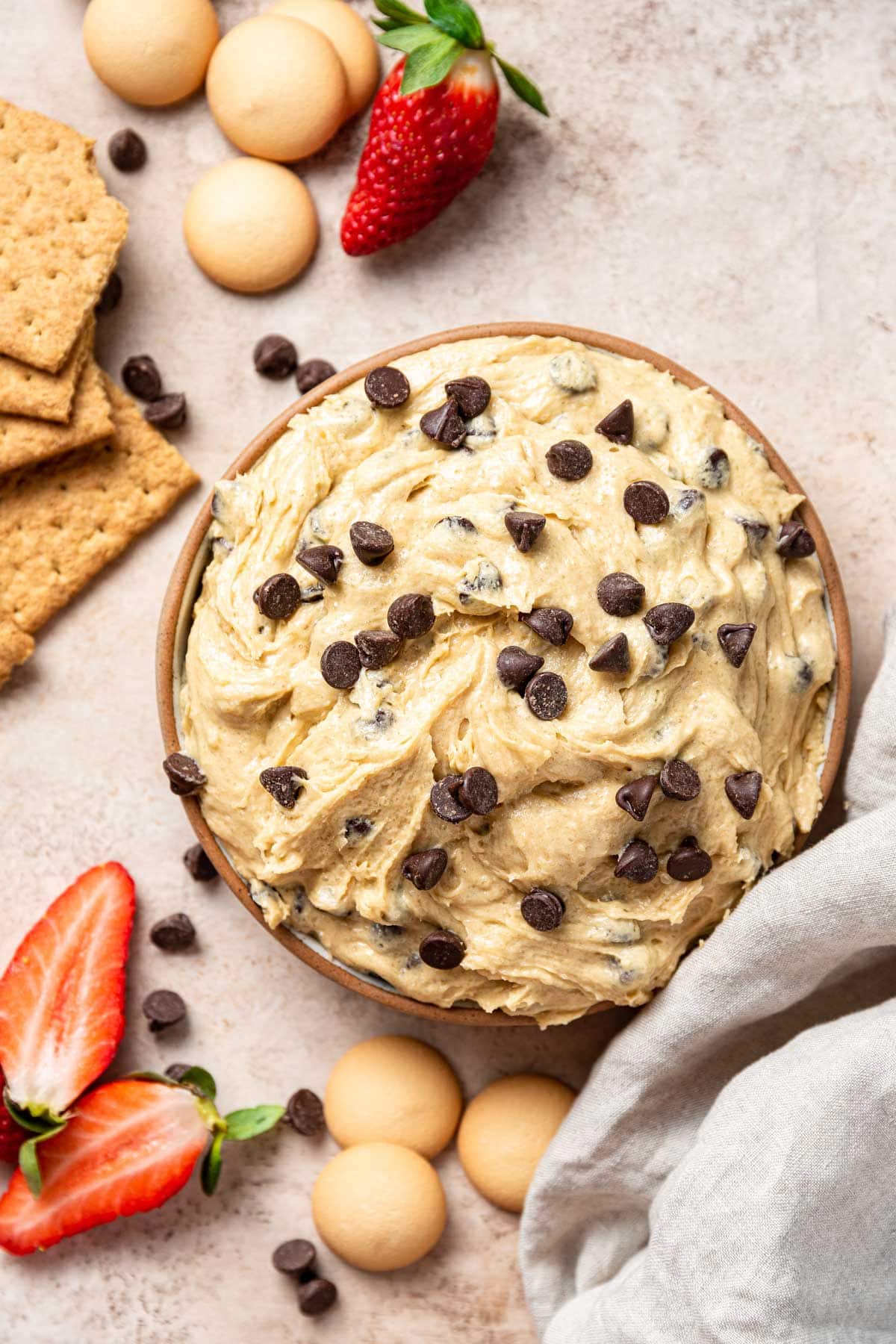 large bowl full of cookie dough dip studded with chocolate chips