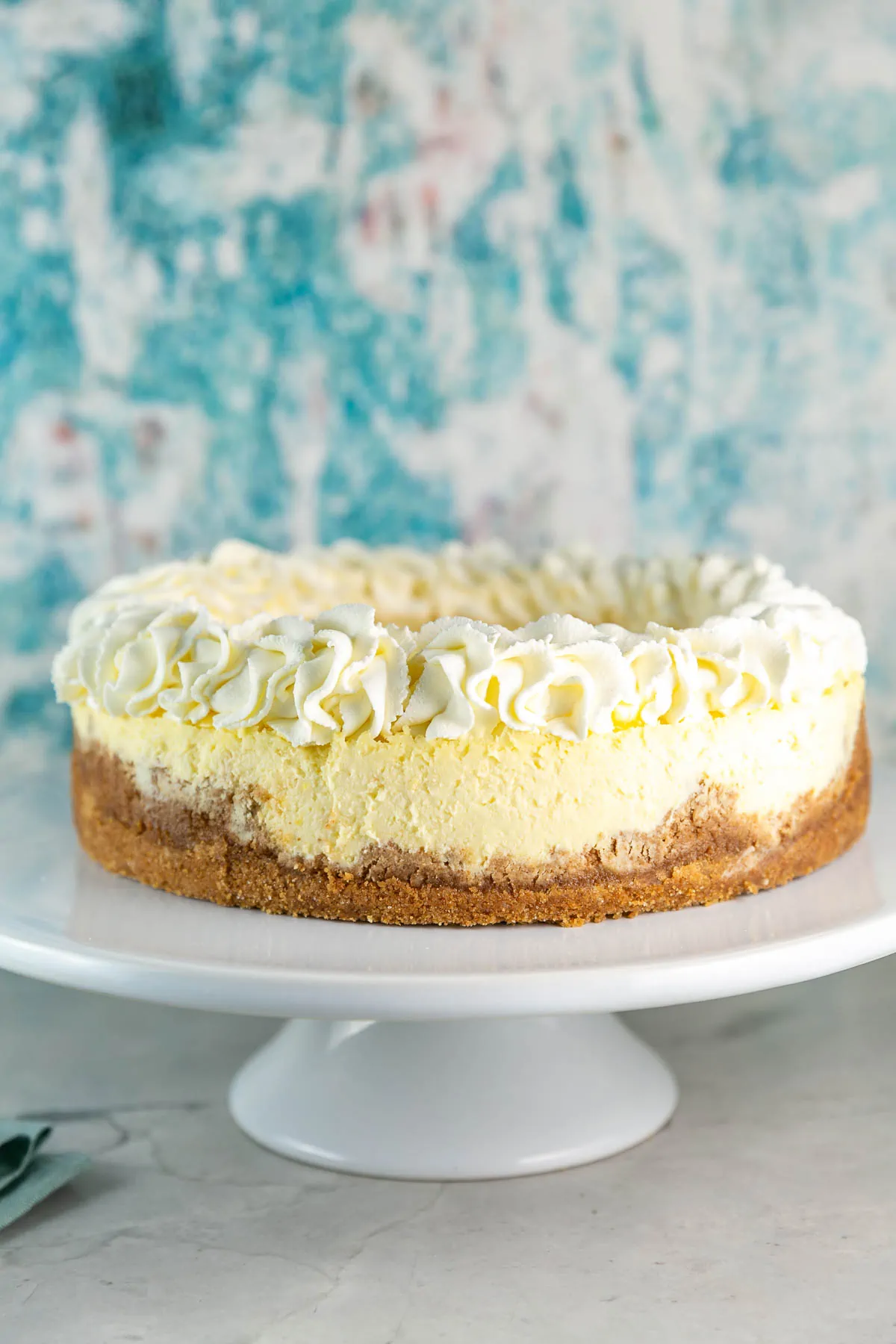 Side view of lemon cheesecake. 