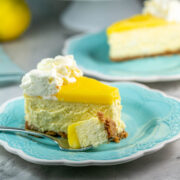 slice of lemon cheesecake on a dessert plate