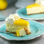 slice of lemon cheesecake on a dessert plate