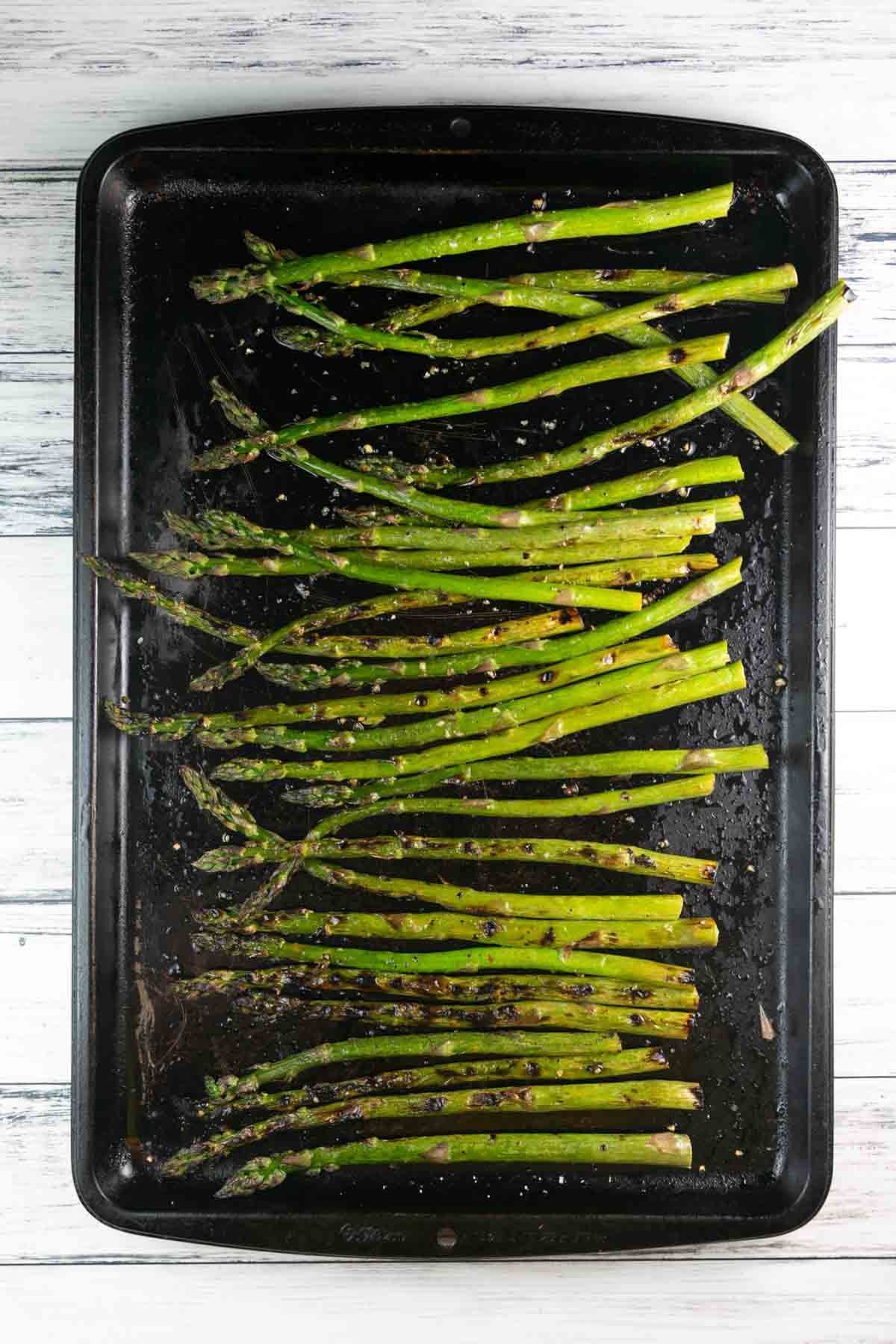 slightly charred asparagus after grilling