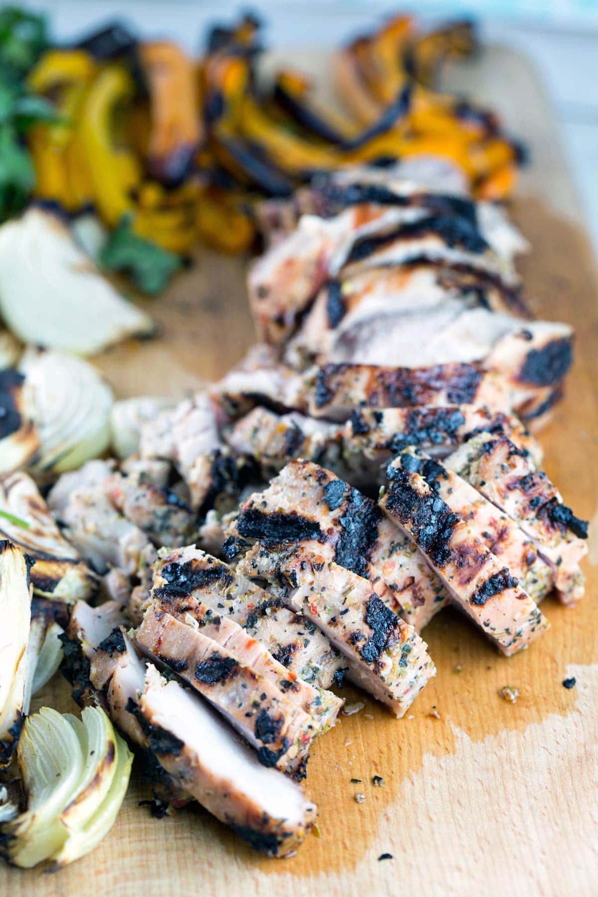 grilled pork tenderloin on a cutting board