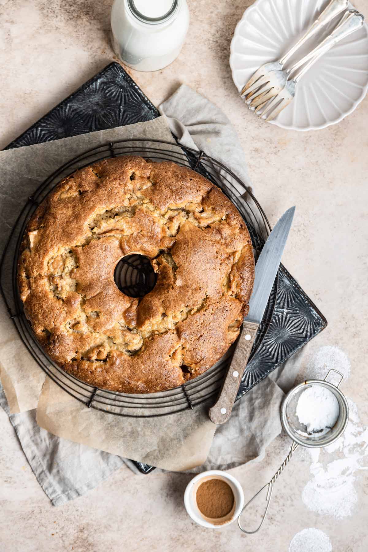 apple cake on a wire cooling rack