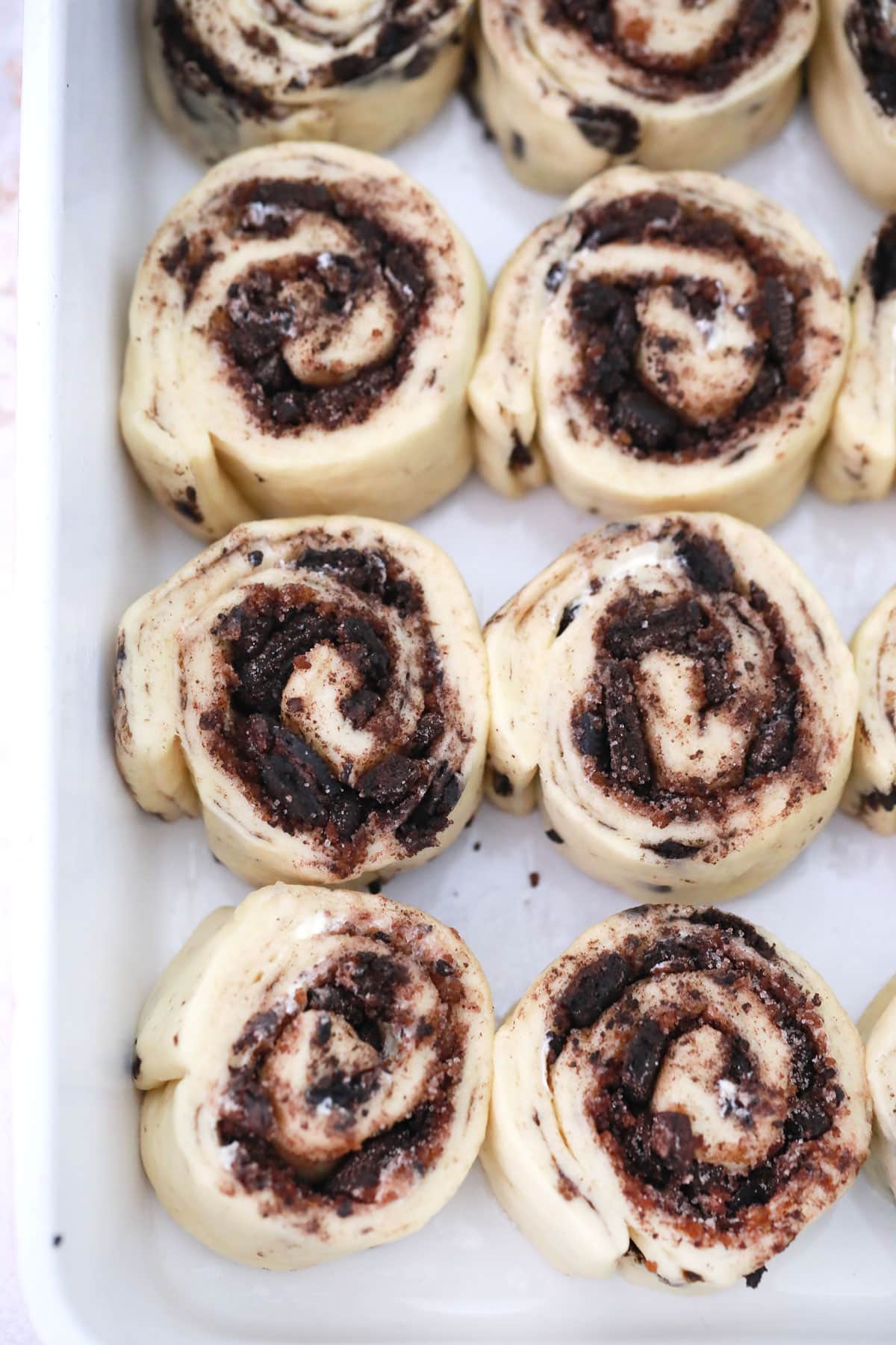 unbaked oreo cinnamon rolls in a baking dish