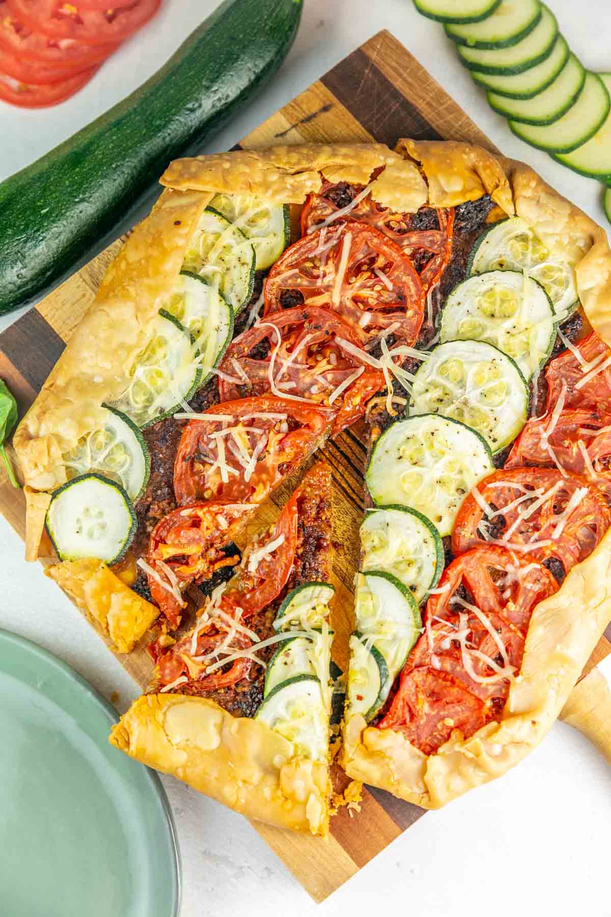 rustic galette filled with slices of fresh tomatoes and zucchini