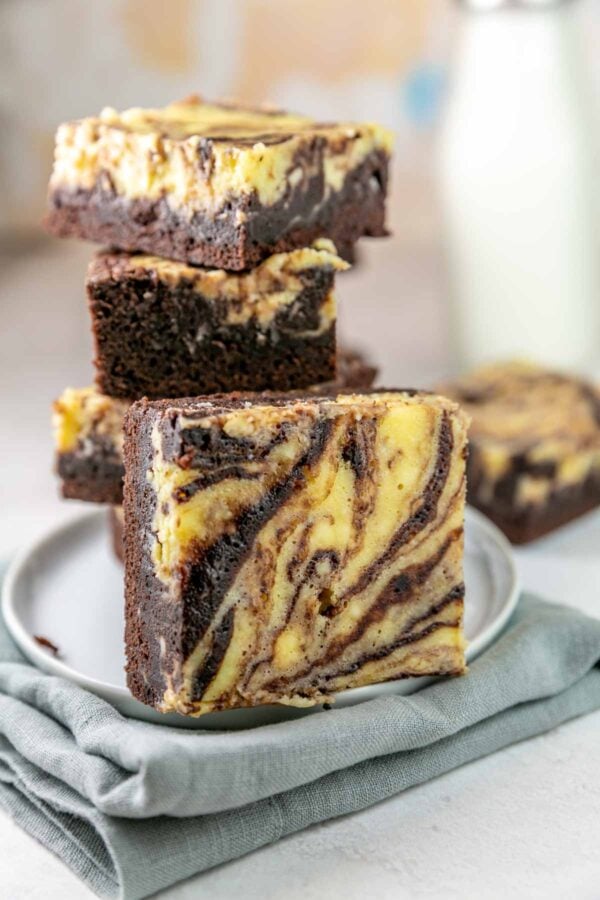close up view of a brownie marbled with cream cheese