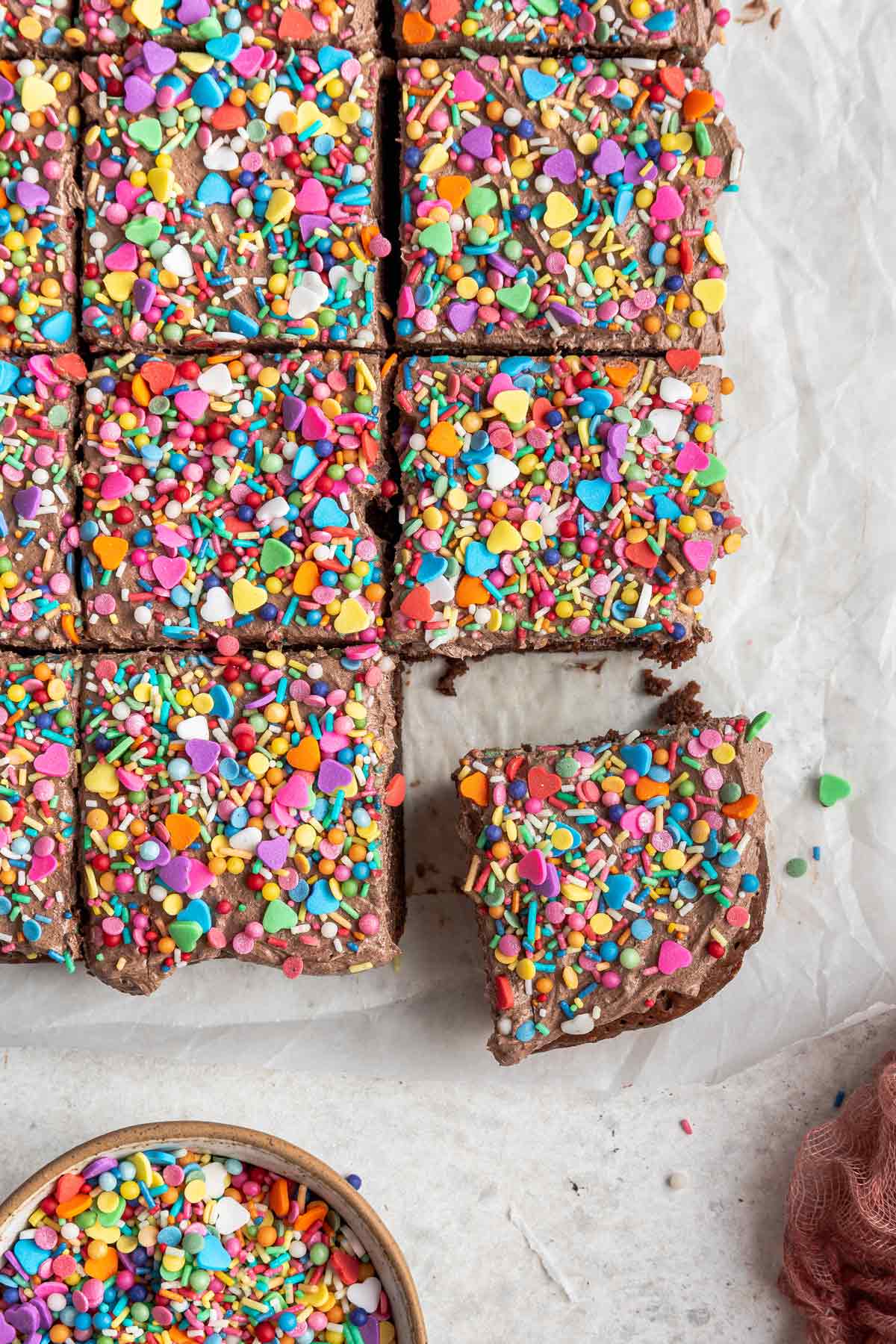 brownies covered in sprinkles cut into squares